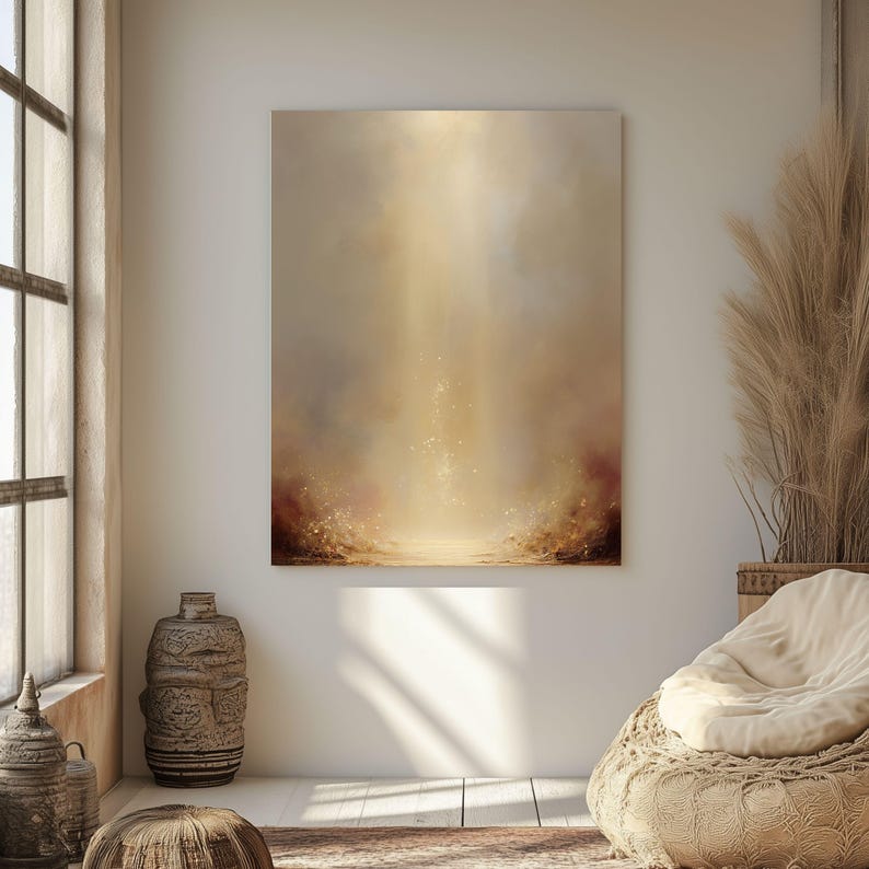 May include: An abstract canvas art piece with a warm color palette. The artwork features a blend of beige, brown, and gold hues, with a bright light emanating from the center. The painting is displayed on a white wall, creating a serene atmosphere.