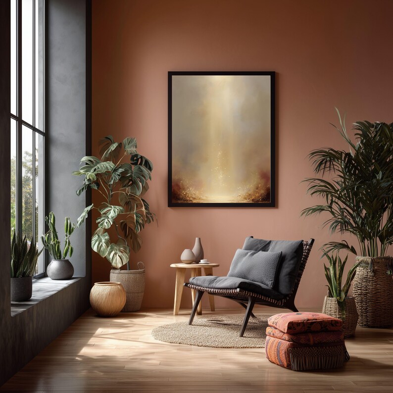May include: A cozy living room scene with a framed abstract art piece, a dark wicker chair with gray cushions, and various potted plants. The room features a large window, wooden floors, and a warm color palette.