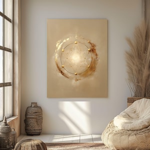 May include: A beige canvas print with a gold geometric design and a central light source. The artwork is displayed in a room with natural light, a window, and decorative elements, creating a calm atmosphere.