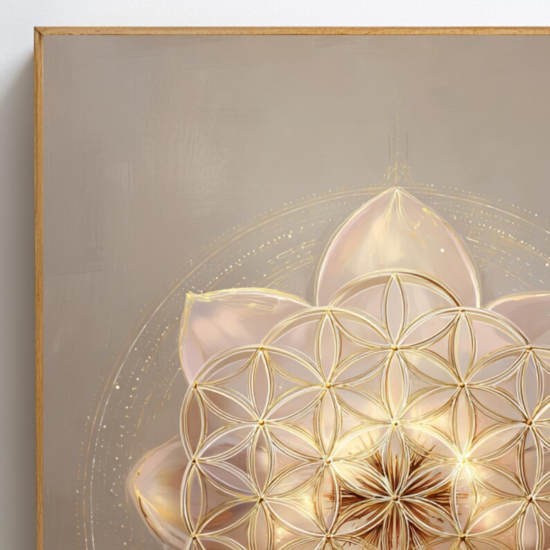 May include: Close-up of a framed artwork with a gold and pink floral design. The artwork has a geometric pattern at the centre, with a light beige background and a wooden frame. The design is reminiscent of a lotus flower.