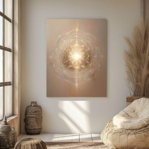 May include: A large, rectangular canvas print featuring a golden, geometric design. The artwork has a central, bright light source surrounded by intricate, radiating lines. The color palette is warm, with beige and gold tones. The print is displayed in a well-lit room.