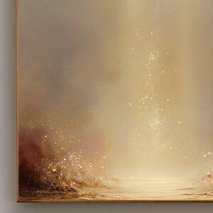 May include: Abstract landscape painting with a warm color palette. The artwork features a blend of beige, brown, and gold hues, with a textured effect. Sparkling accents add a touch of light and depth, creating a dreamy, ethereal atmosphere. The painting is framed in a gold-colored frame.