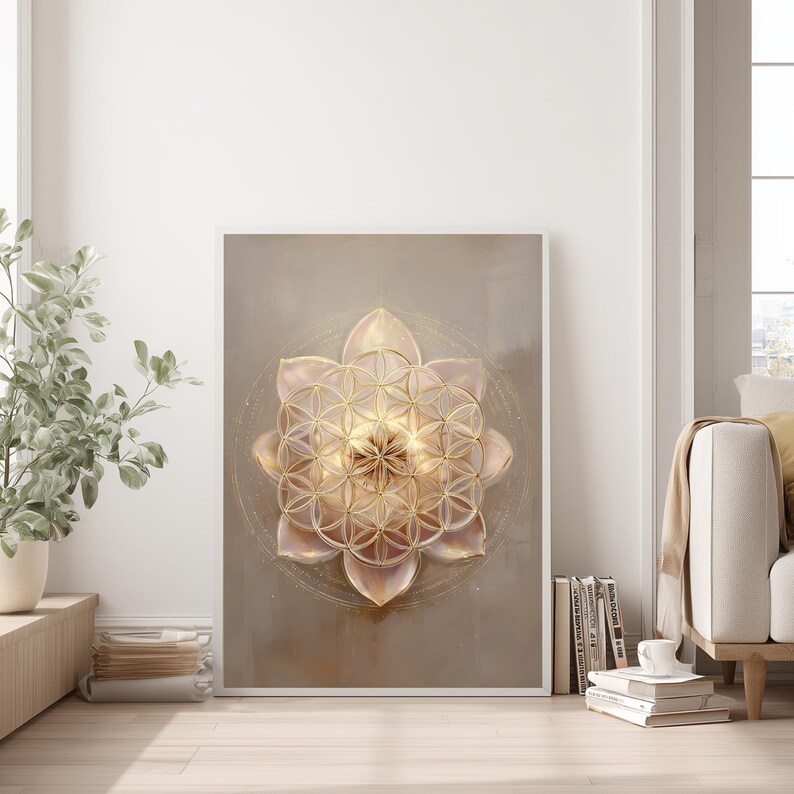 May include: Framed wall art with a gold and pink flower of life design. The artwork is set in a white frame and has a soft, neutral colour palette. The design is a geometric pattern with a spiritual theme.