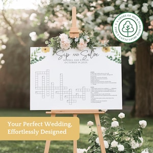 May include: A white crossword puzzle sign on an easel, with the words "Sip and Solve" and the names Sophia and Ethan, and the date October 19, 202X. The sign is decorated with floral arrangements and greenery.