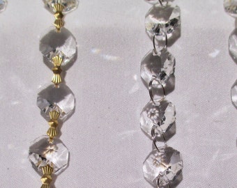 Graduated string of crystal prisms for chandelier or lamp multiples available Graduated string of crystal prisms for chandelier or lamp multiples available