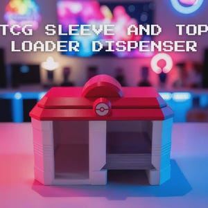 May include: A red and white TCG sleeve and top loader dispenser. The dispenser has a red roof and a white body with a circular design on the front. The text "TCG SLEEVE AND TOP LOADER DISPENSER" is displayed above the dispenser.