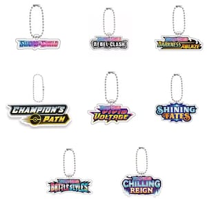 Pokémon Keychain | TCG Set Logo (sword & shield, rebel clash, vivid voltage, shining fates, battle style) – Binder Collector Accessory