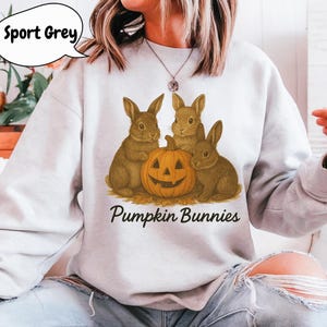 Felpa con coniglietti di zucca – Grafica retrò con coniglio spettrale e zucca