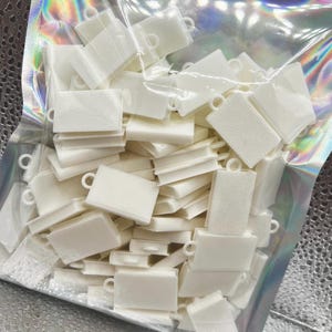 Minilibros DIY: Dijes impresos en 3D para llaveros