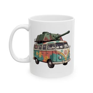 May include: White ceramic mug with a colourful illustration of a vintage van topped with a tank turret. The van is painted in blue, orange, and green with flower and peace sign details. A unique and eye-catching design.