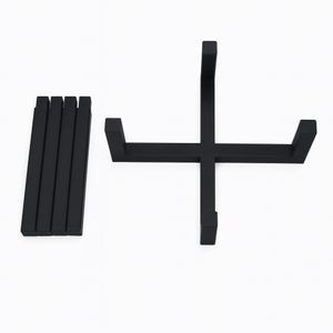May include: A black wooden plant stand with a cross-shaped base and four vertical support pieces. The stand is designed to hold a plant pot. The stand is made of wood and has a matte finish.