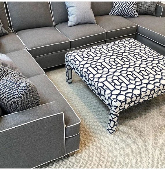 Cushioned coffee table ottoman online