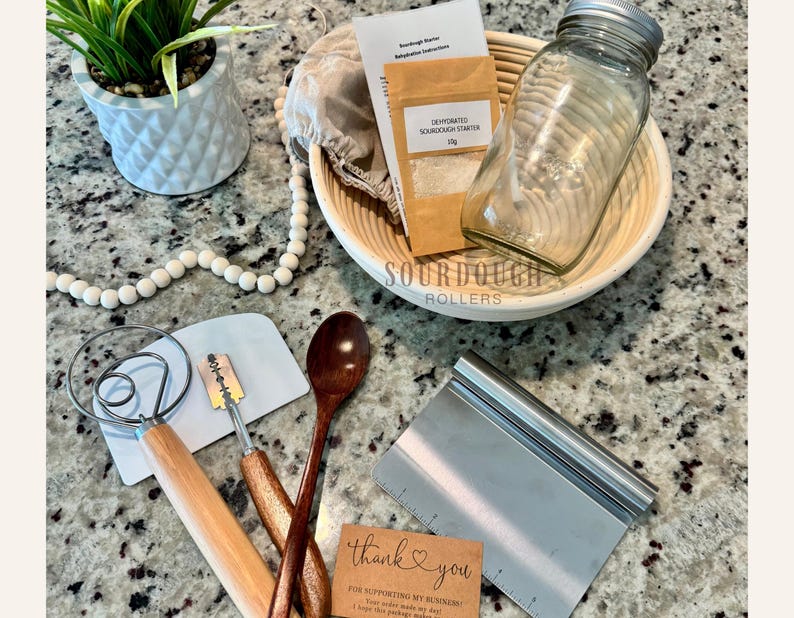 Sourdough starter kit with banneton basket, whisk and live starter