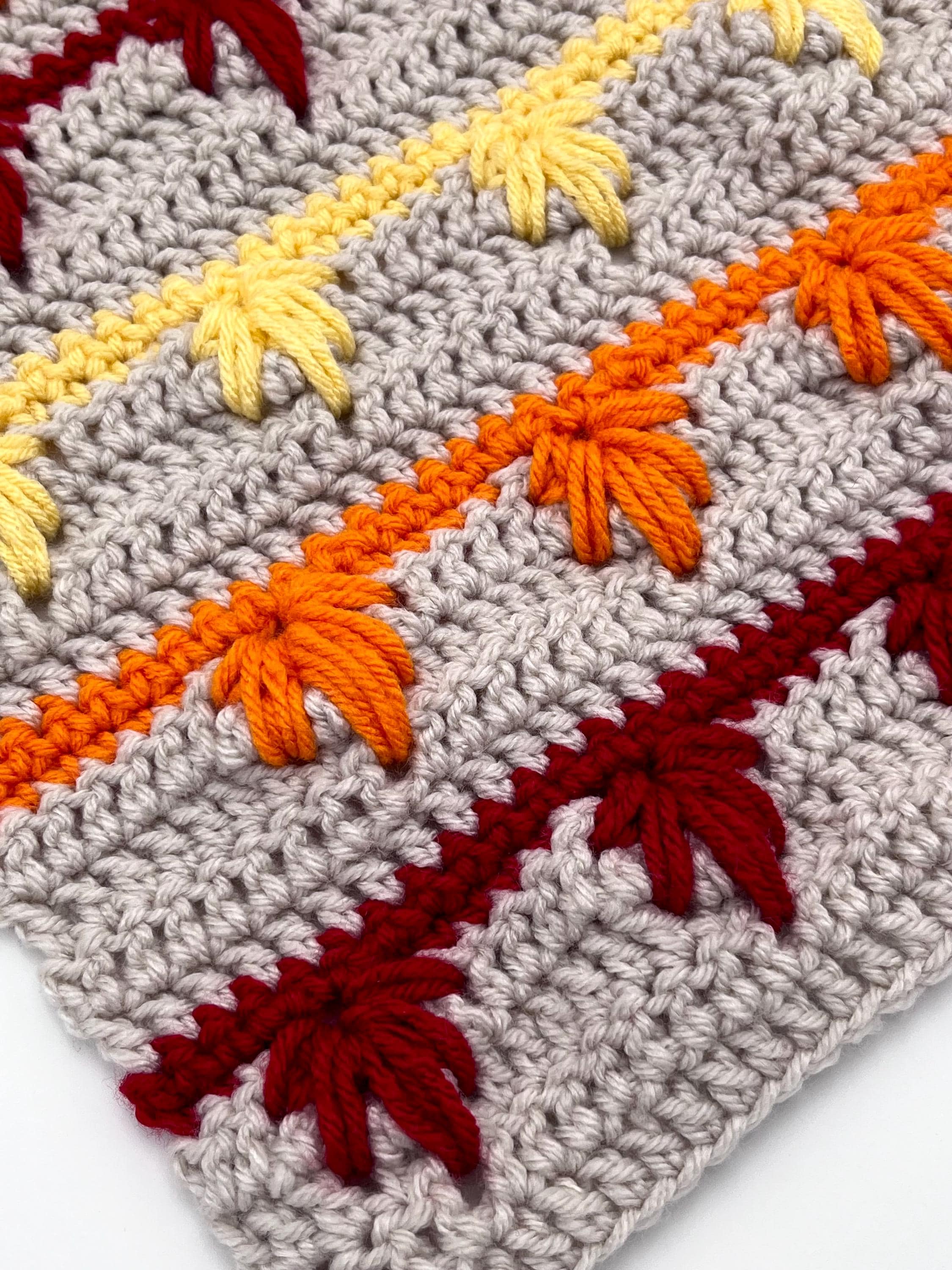 38 Crochet Leaf Patterns To Welcome Fall With Appliqués, Garlands, and Botanical Details 17 Autumn Leaves Crochet Throw Pattern: Fall Foliage Blanket