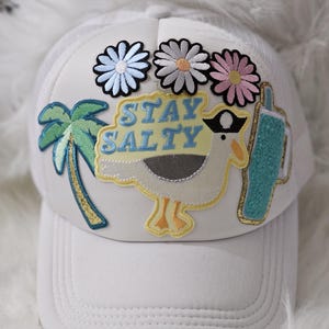 STAY SALTY TRUCKER hat with beach themed patches