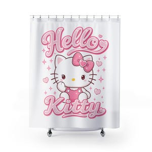 May include: White shower curtain featuring a pink Hello Kitty design. The design includes the words "Hello Kitty" in pink script, along with a cartoon image of Hello Kitty wearing a pink dress and bow. Pink hearts and stars surround the character.
