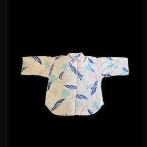 May include: A pink, blue and white short-sleeved button-up shirt with a floral print.
