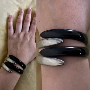 Vintage late 1970s / 1980s two tone black & silver metal wrap around claw style clamper bracelet