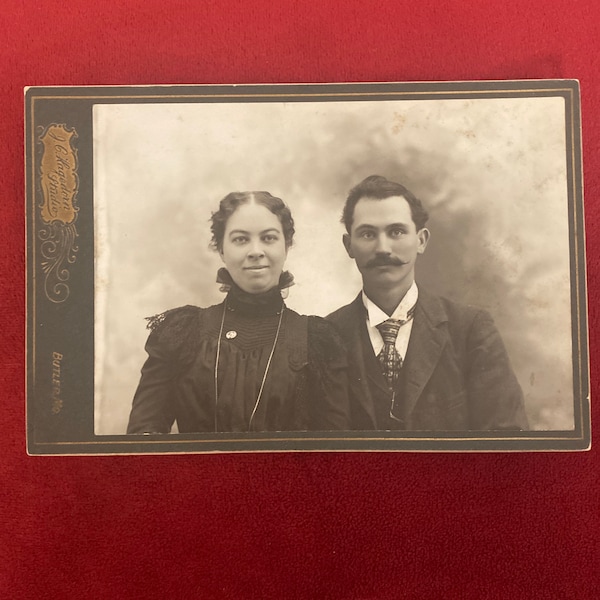 Antique 1890s black and white victorian era couple family photograph by J.C. Hagendorn