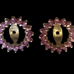 May include: A white ceramic mug with a black handle and the text "But First, Coffee" in a bold, black font. The mug is set against a neutral background, highlighting its simple design.