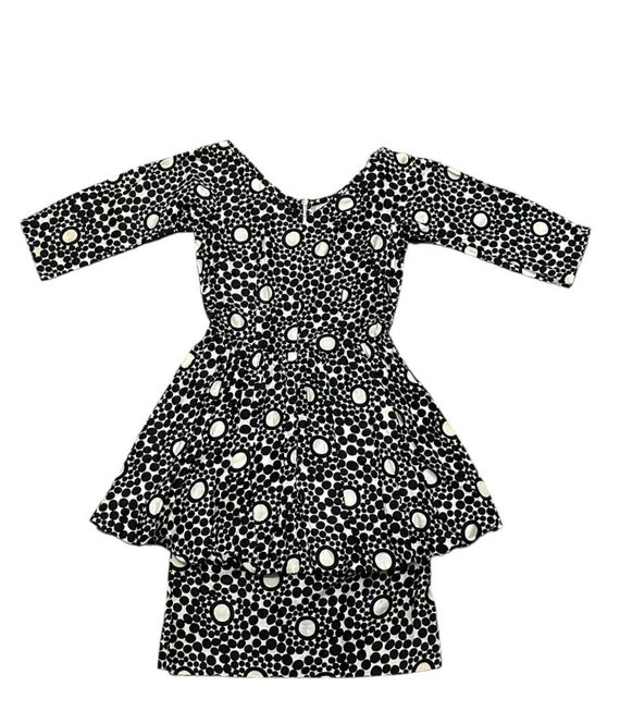 black and white polka dot peplum dress Vintage 1950s PRETTY MISS FASHIONS black & white polka dot / circle print  peplum dress w/ 3/4 sleeves and plunge neckline, size 6