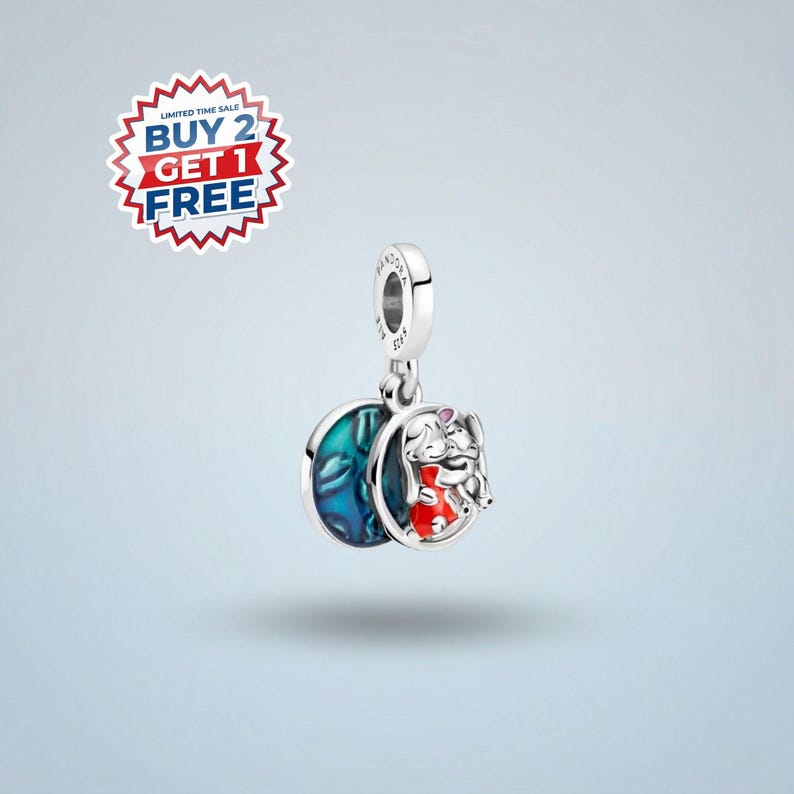 a silver charm bracelet with a pendant in the shape of a character from the Disney movie "Snow White". The bracelet is set against a light blue background, and there is a red and white circular sticker in the top left corner that reads "BUY 2 GET 2 FREE".