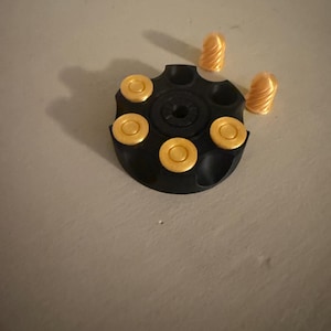 revolver che si agita con i proiettili
