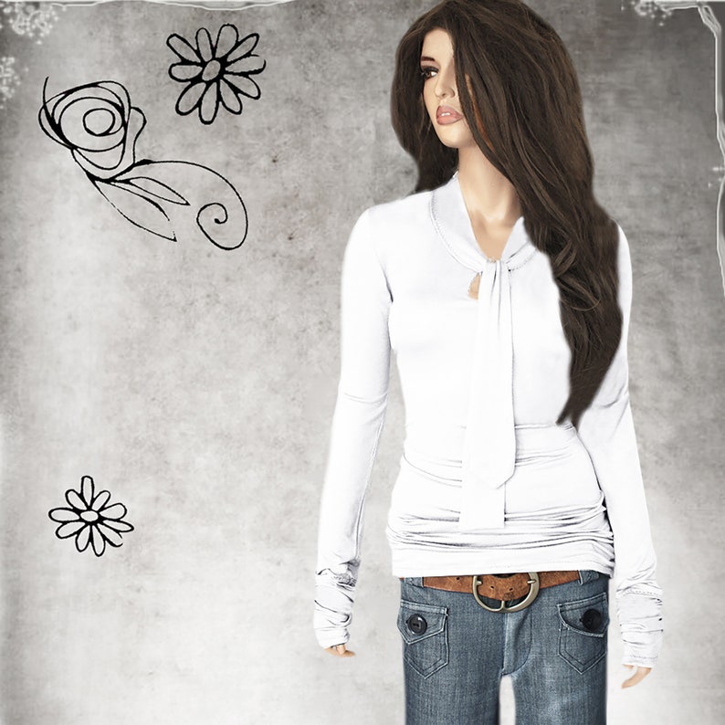 May include: White long-sleeved shirt with a tie detail at the neckline. The shirt has a fitted silhouette and is made of a soft, stretchy fabric. The model is wearing the shirt with blue jeans and a brown belt.