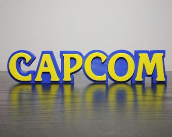 Capcom Logo Sign ~8.25in Video Game Decor (3D printed, gamer, game room, gaming, gift, decor, videogame, retro, shelf display)