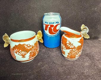 BUTTERFLY HANDLED Creamer & Sugar Set in Good condition / No repairs or Cracks.