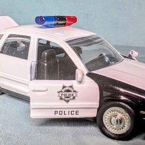 Las Vegas Crown Victoria Police Car.  Die-cast, never played with, mint condition.