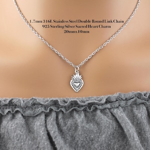 Sterling Silver Dainty 20x10mm sacred heart charm on a 316L stainless steel 1.7mm double loop chain.