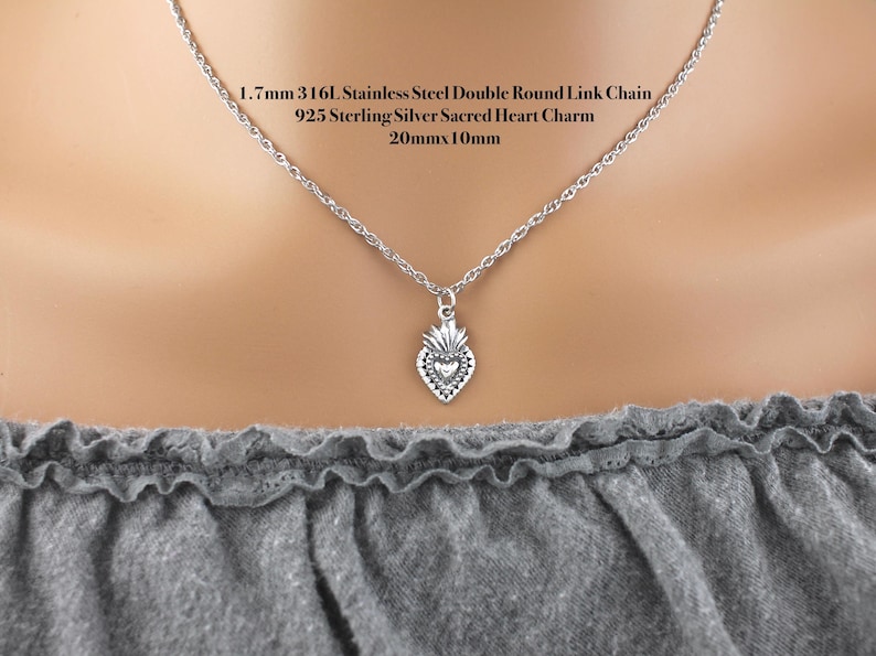 Sterling Silver Dainty 20x10mm sacred heart charm on a 316L stainless steel 1.7mm double loop chain.