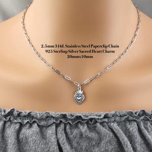Sterling Silver Dainty 20x10mm sacred heart charm on a 316L stainless steel 2.5mm paperclip chain.