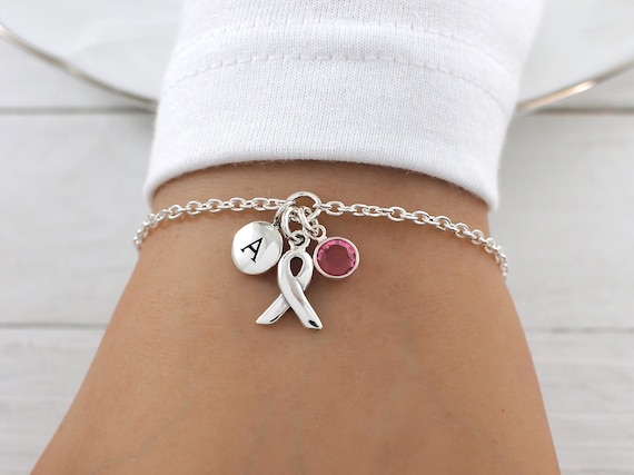 Pink Ribbon Bracelets Jewelry for Breast Cancer Awareness - China Pink Ribbon  Bracelet and Charm Bracelet price | Made-in-China.com