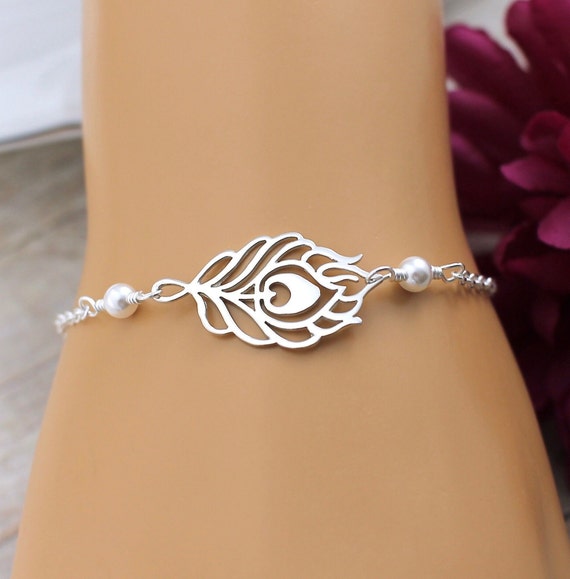 Omg peacock feather bracelet sale