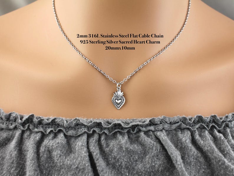 Sterling Silver Dainty 20x10mm sacred heart charm on a 316L stainless steel 2mm flat cable chain.