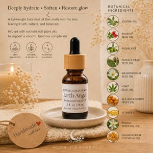 May include: A brown glass bottle of Earth Angel Botanical Facial Oil, 5 fl oz, with a wooden cap and black dropper. The bottle sits on a small, white ceramic dish. The image includes text about the product's benefits and ingredients.