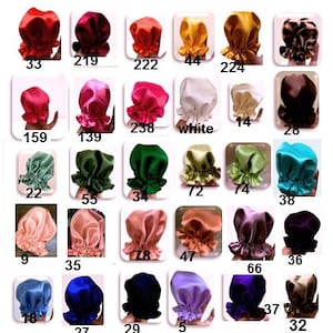 May include: A selection of satin bonnets in a variety of colours, such as red, pink, green, blue, and gold. Each bonnet features a ruffled edge and is presented against a white backdrop. Numbers are printed on each image.