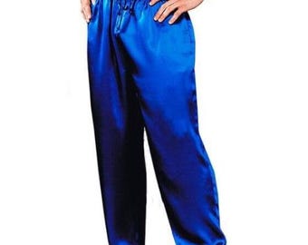 May include: Royal blue satin pajama pants with a drawstring waist. The pants have a loose, flowing fit and a subtle sheen. These comfortable sleep pants are a solid color and are suitable for lounging or sleeping.