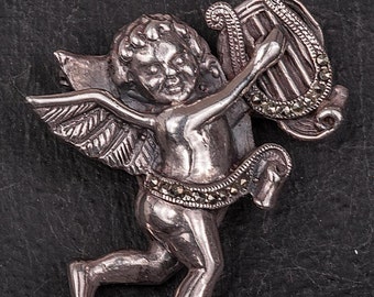 Vintage Silver Brooch and Pendant combination in Silver and Marcasite depicting Cherub with Harp