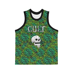 May include: A sleeveless vest featuring a green and black skull design. The word "CULT" is printed in white across the chest, with a dripping skull graphic below. The vest has black trim.