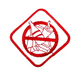 May include: Red embroidered patch with a white outline of a square with a circle inside. The circle has a diagonal line through it and a drawing of a bottle and a can inside.