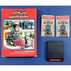 May include: A vintage Intellivision video game set, featuring a red box with "Loco-Motion" text and train artwork. Includes game cartridges and instruction cards. The box reads "Use with any INTELLIVISION Master Component."