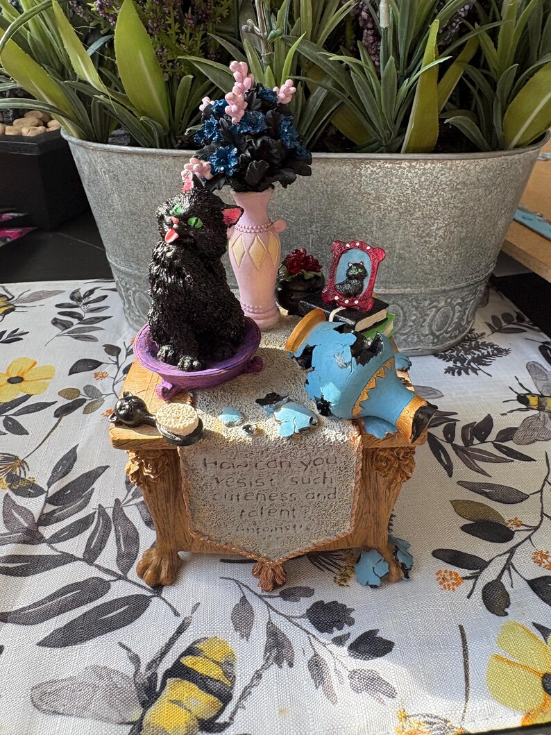 May include: A set of three ceramic mugs with a speckled, matte finish. The mugs are in shades of cream, light brown, and dark brown. Each mug has a simple, minimalist design, perfect for coffee or tea.