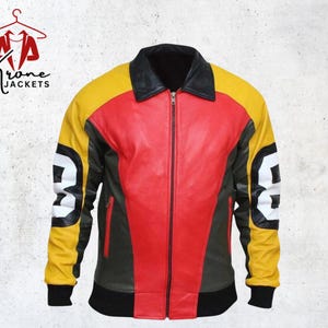 May include: A multi-colored leather jacket with a black collar and cuffs. The jacket features a red center panel, yellow sleeves, and black and white number "8" graphics on the sleeves. The jacket has a zipper closure and the text "Krone Jackets".