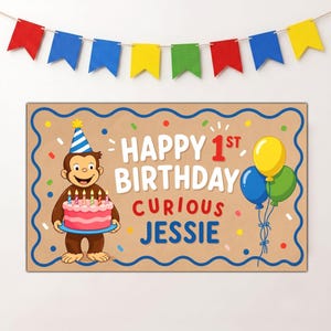 May include: A rectangular birthday banner with a tan background, featuring a cartoon monkey wearing a blue and white striped party hat and holding a pink cake with five lit candles. The text reads HAPPY 1ST BIRTHDAY CURIOUS JESSIE.