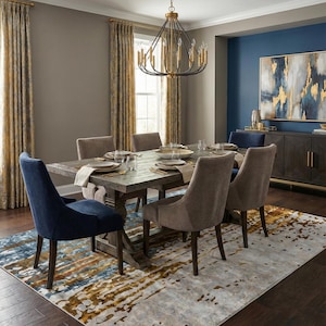 May include: A dining room set with a large wooden table and six upholstered chairs. The table is set with plates and silverware. A patterned rug in shades of blue, gold, and gray sits beneath the table. A chandelier hangs above the table.