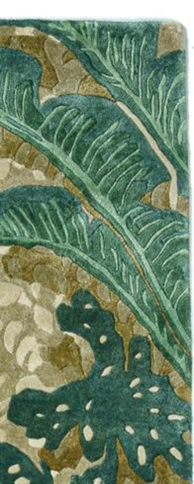 May include: A rectangular rug with a botanical design. The rug features large, stylized green leaves against a background of beige and brown organic shapes. The leaves have detailed veining, and the overall texture appears plush.