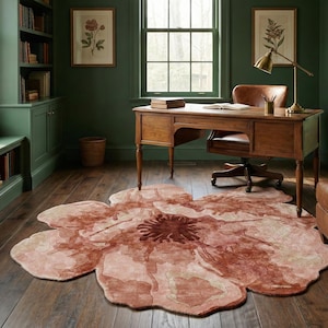 May include: A set of three ceramic mugs with a speckled, matte finish. The mugs are in shades of cream, light gray, and dark gray. Each mug has a simple, minimalist design, perfect for coffee or tea.